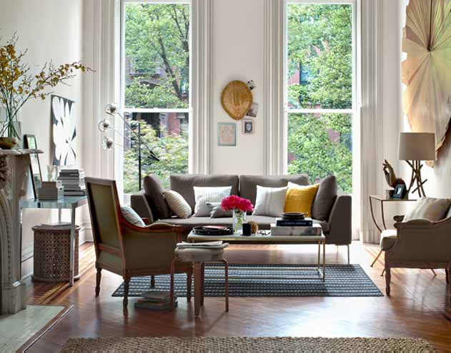 living room with a couch and many Nake Berkus throw pillows